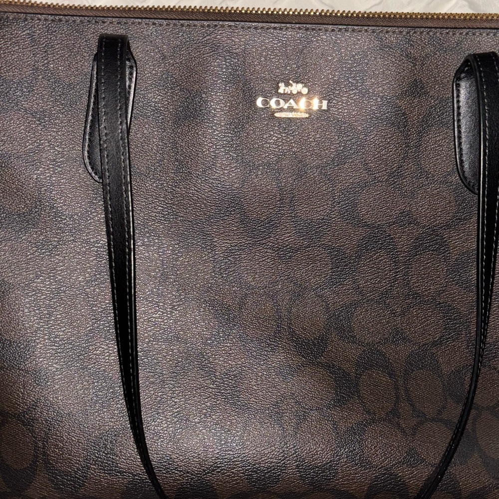 Coach large city tote , zippered signature canvas in brown/ black.